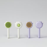 Pet grooming brush designed to collect loose hair and fur