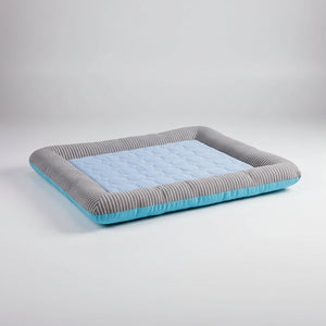 Self-cooling pet mat for dogs and cats in blue